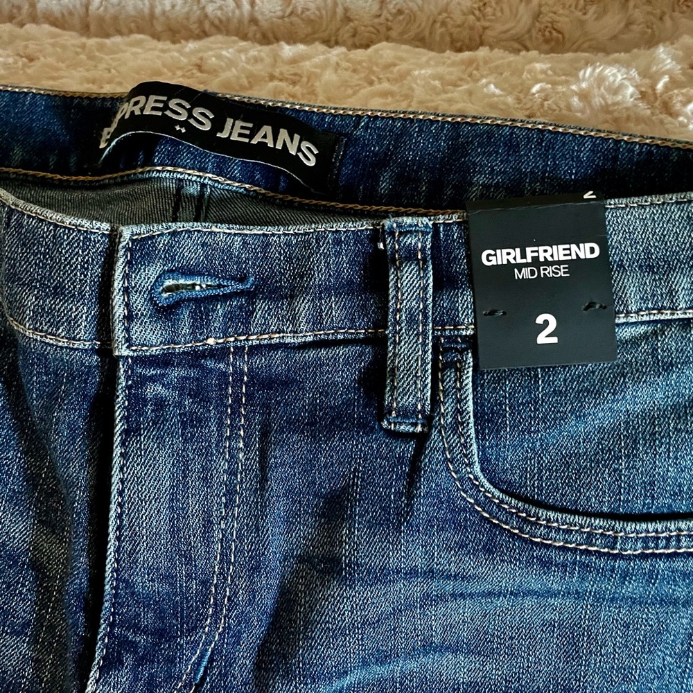 Express Jeans Girlfriend Mid Rise. Size 2.  Some distressing on the jeans. NWT